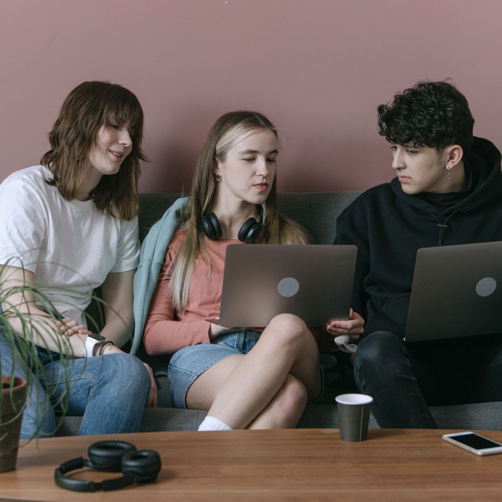 teens on laptops